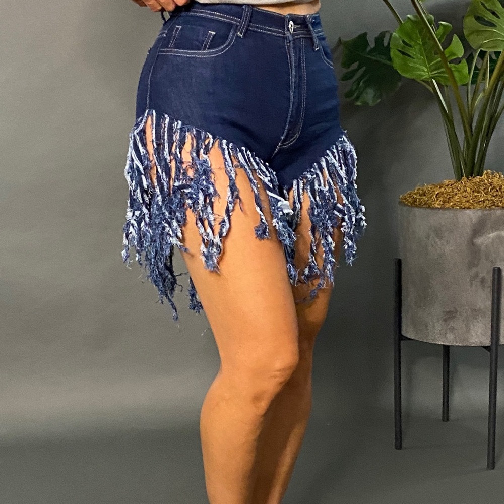Fringed blue Jean shorts.